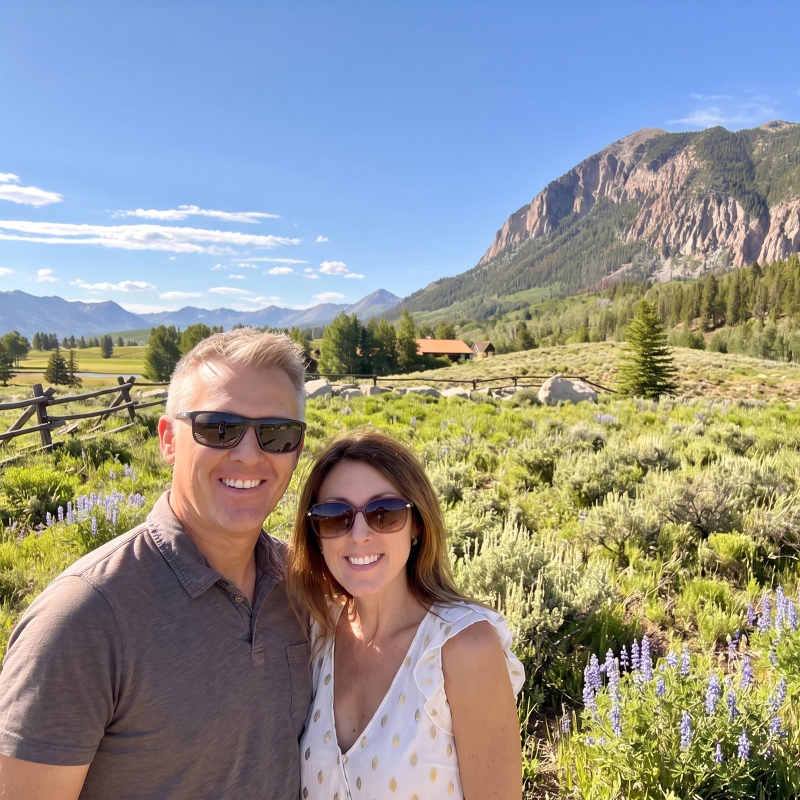 Chris and Andrea Greene in a wildflower meadow below the Crested Butte peaks
