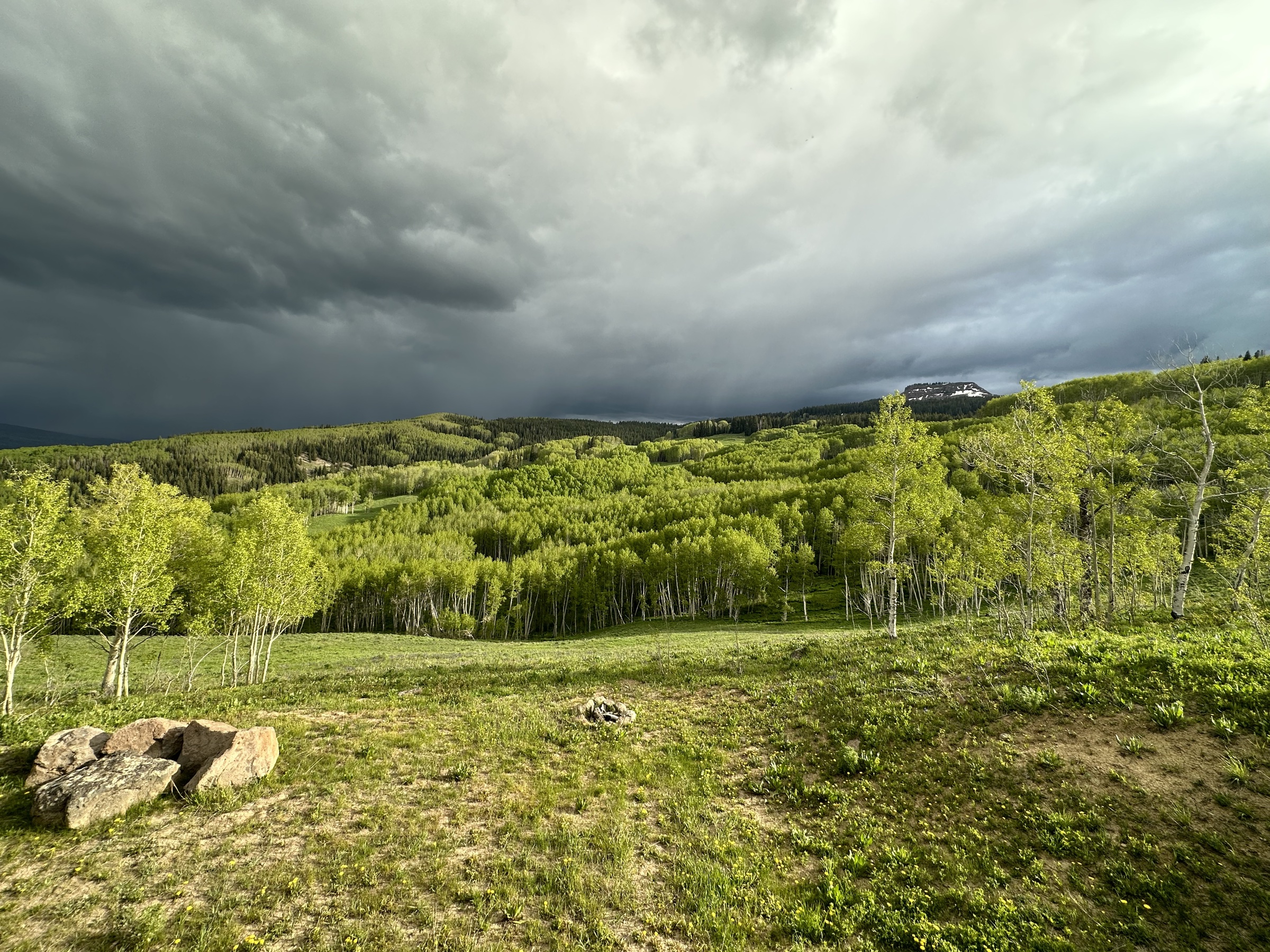 Weather moving over an aspen valley